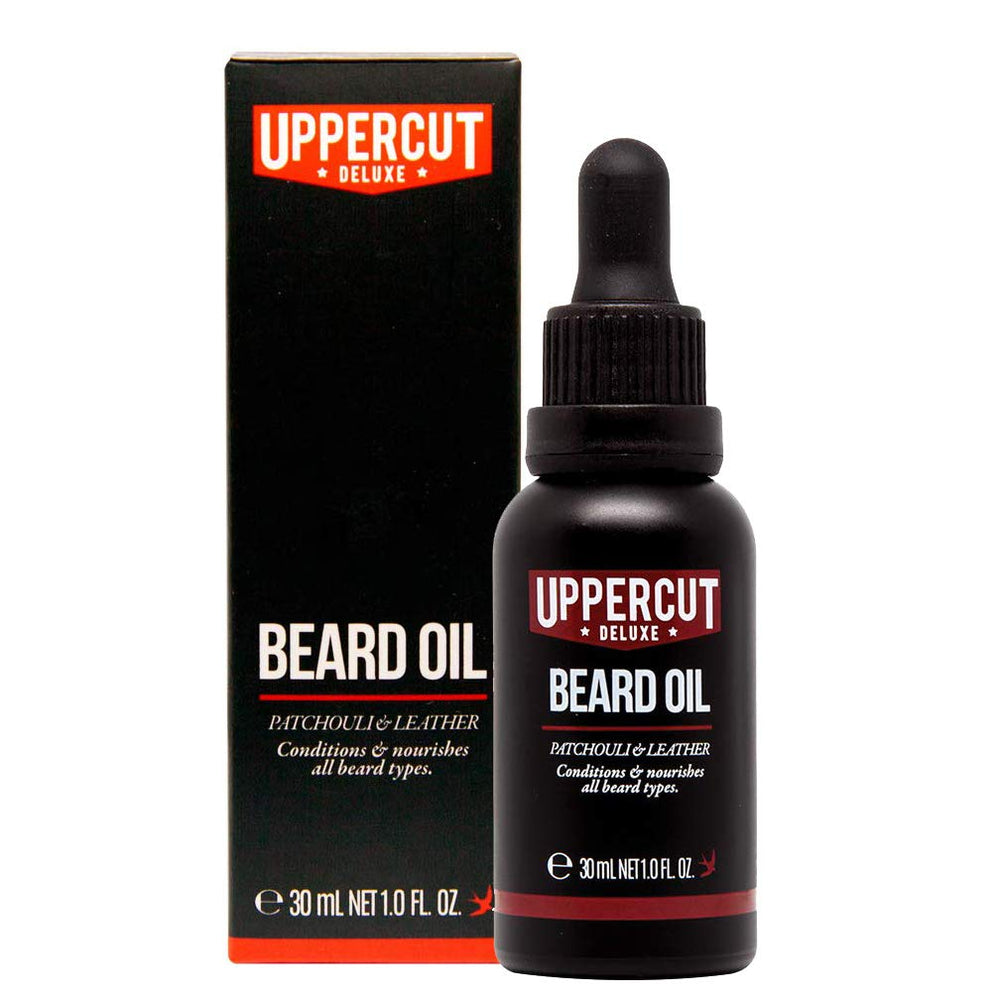 Uppercut Deluxe Beard Oil bottle dispensing a lightweight, non-greasy formula.