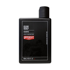 UPPERCUT DELUXE Clear Scalp Shampoo bottle pour demonstrates easy application and refreshing scalp care