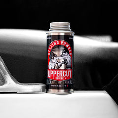 Uppercut Deluxe texture powder hands applying demonstrates quick texture and light hold.