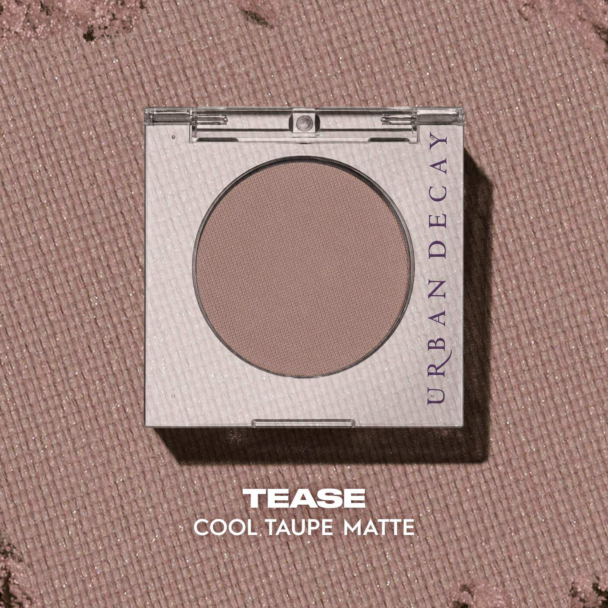 Urban Decay 24/7 Eyeshadow Tease application with fingers demonstrates ultra-blendable formula