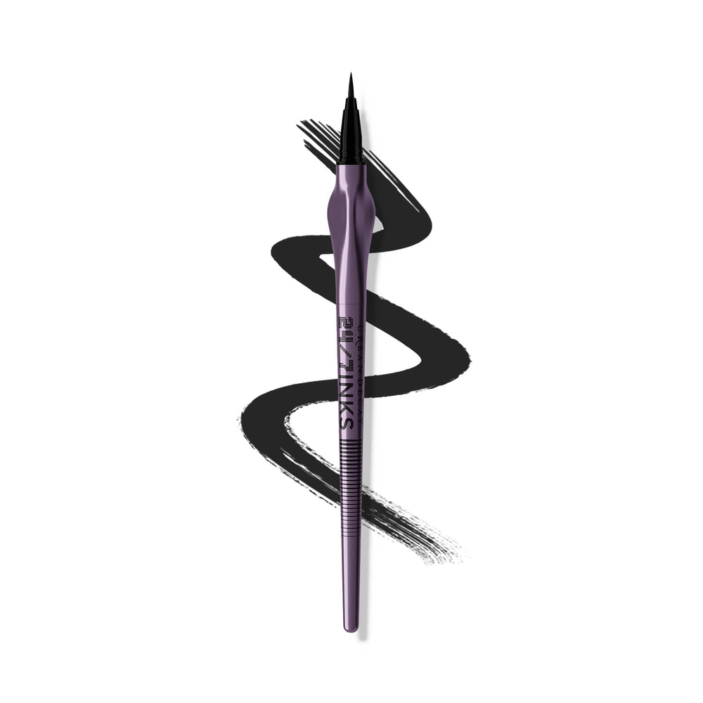 URBAN DECAY 24/7 Inks matte black bottle close-up, bold color and longevity.