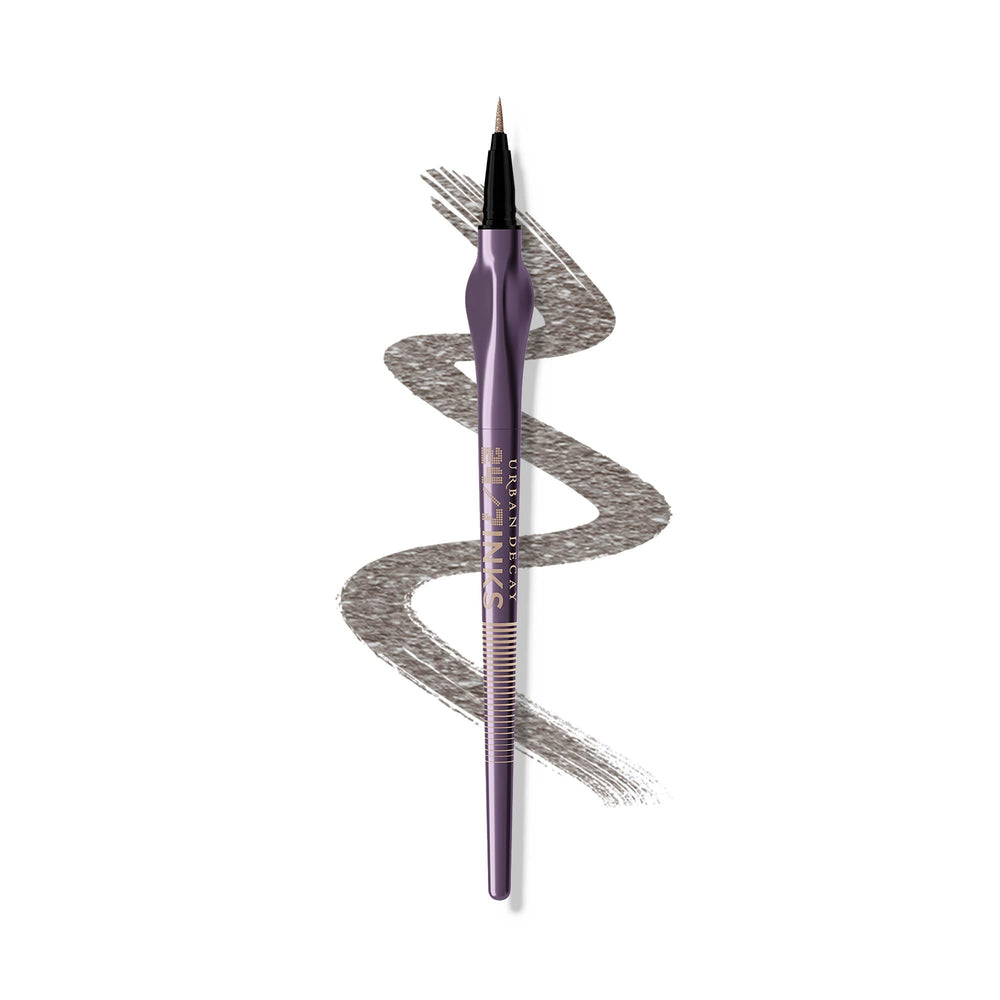 Urban Decay 24/7 Inks Oil Slick close-up showing gunmetal shimmer for precise liner.
