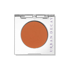 Urban Decay 24/7 Longwear Eyeshadow Single Wild One compact close-up showing burnt orange matte pigment with long-lasting color.