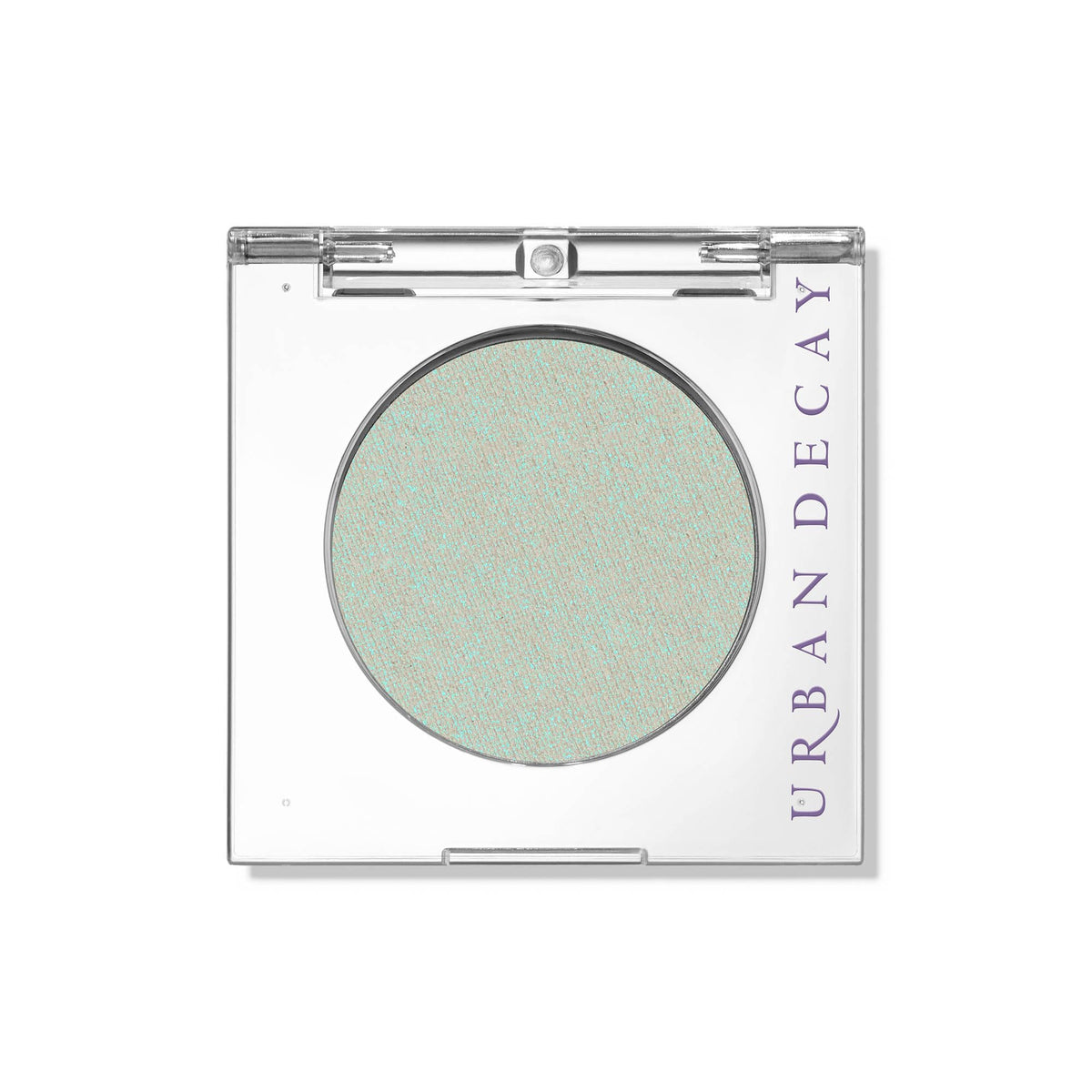 Urban Decay Lucid Teal Shimmer Transformer swatch shows vivid pigment for bold lids.