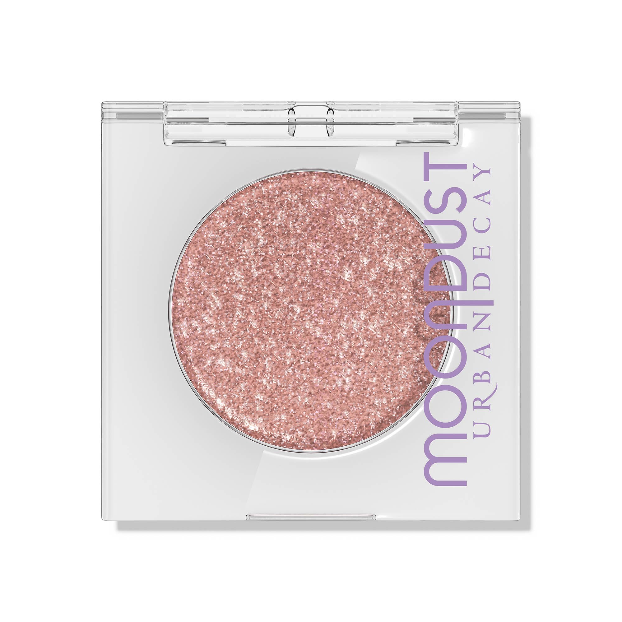URBAN DECAY Moondust Crushin' Hard peach-pink swatch with silver pearls for everyday glow.