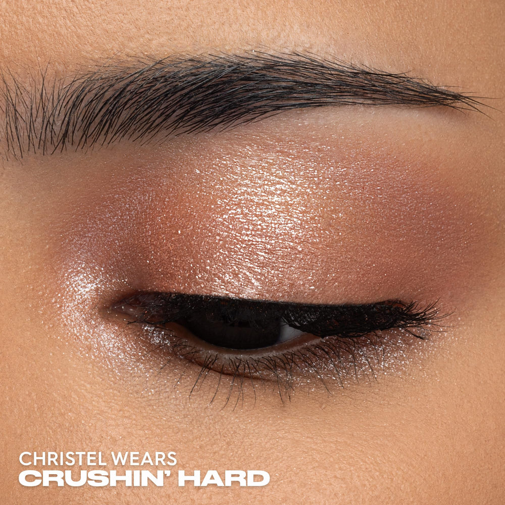 URBAN DECAY Moondust Crushin' Hard close-up showing micro-fine glitter and refined sparkle.
