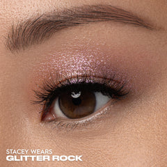 Urban Decay Moondust Space Cowboy swatch demonstrates champagne-gold sparkle and dimension.