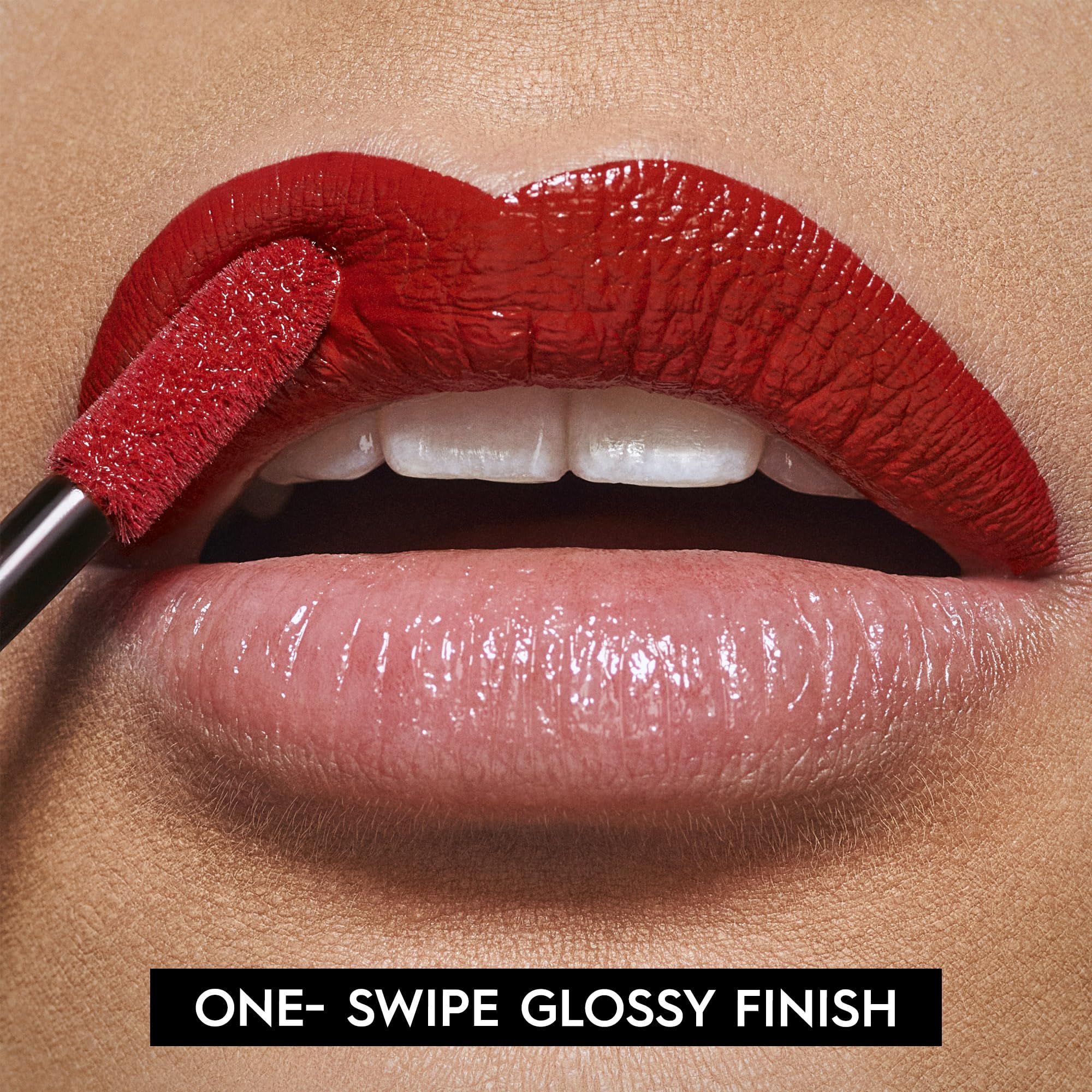 Urban Decay Vice Lip Bond in Unbreakable red for bold daytime look.