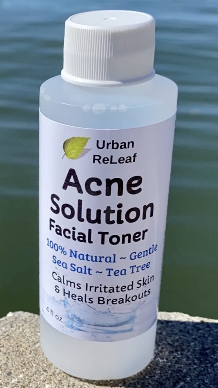 Urban ReLeaf Acne Solution Facial Toner cotton-ball application shows easy daily use.