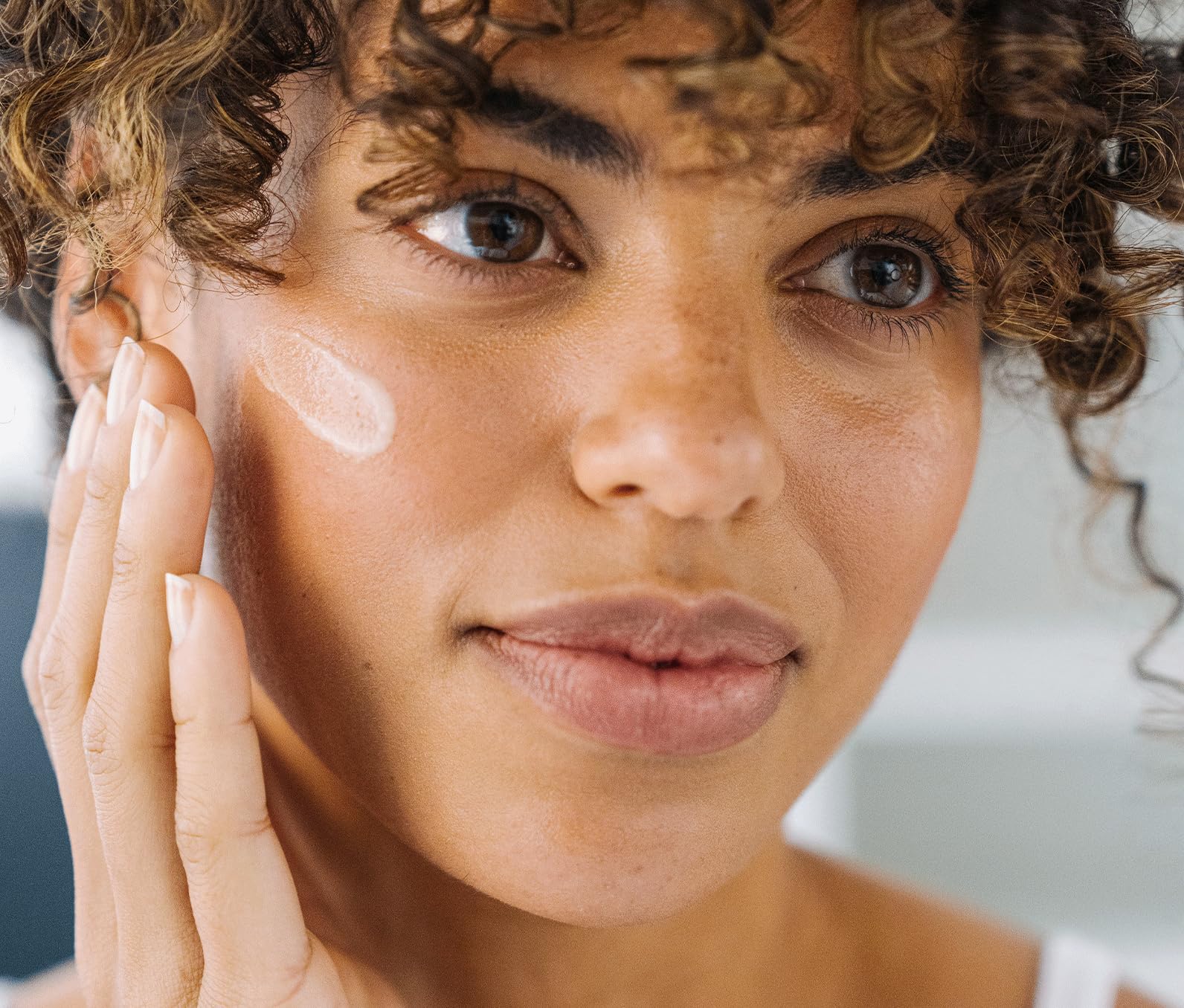 Ursa Major Lunar Bloom Serum close-up texture showing creamy formula.