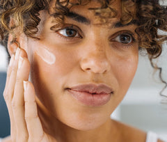 Ursa Major Lunar Bloom Serum close-up texture showing creamy formula.