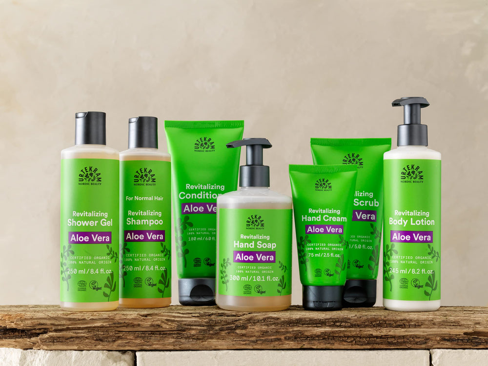 Urtekram Aloe Vera Conditioner in use during hair wash for easy combing.