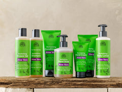 Urtekram Aloe Vera Conditioner in use during hair wash for easy combing.