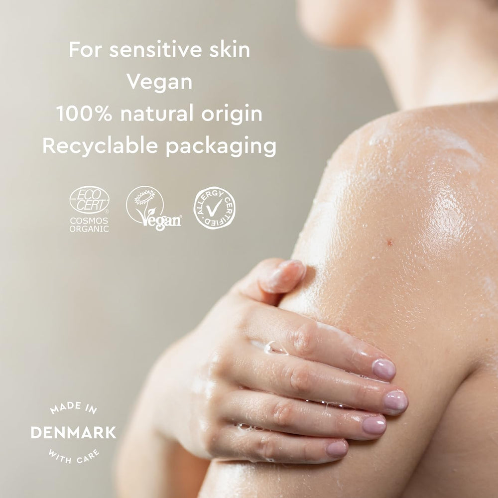 Urtekram No Perfume Shower Gel in use, soft bubbles for gentle cleansing.