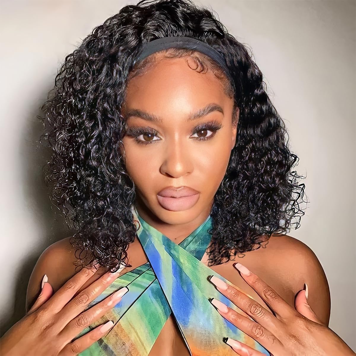Usweety headband wig on model with curly short deep wave for a natural look