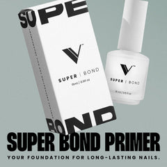 Primer application close-up shows smooth, even coverage for secure nail adhesion.
