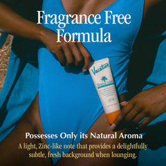 Vacation air freshener Vanilla Breeze bottle releasing subtle fragrance.