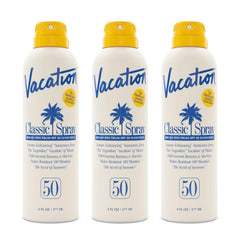 Vacation Classic Sunscreen Spray SPF 50 bottle front shows a transparent finish on skin