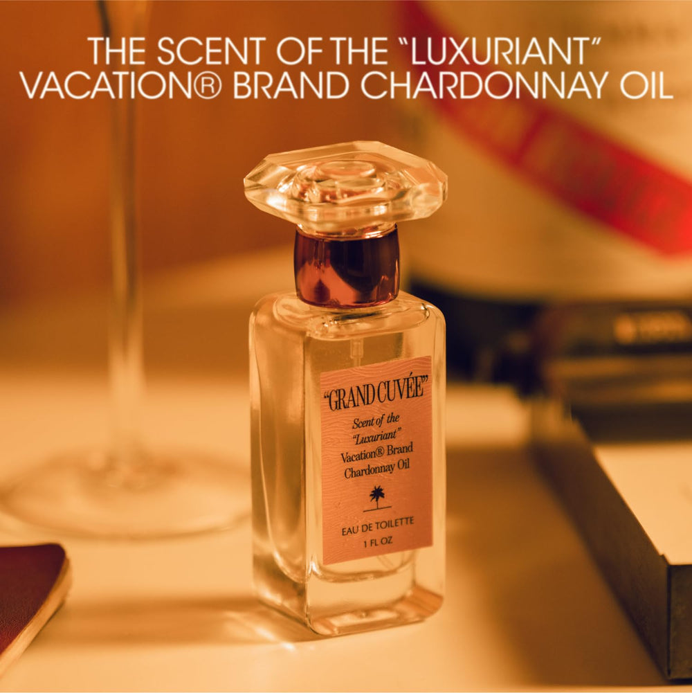 VACATION Grand Cuvée bottle-heart-notes highlight amber and cedarwood for day-to-night wear