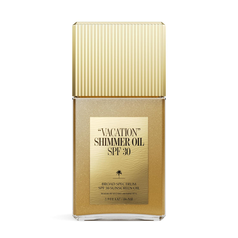 VACATION Shimmer Oil SPF 30 bottle front with radiant, even glow.