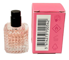 Valentino Born In Roma EDP mini bottle on skin for a test-friendly moment.