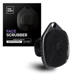 Vanibiss The Man silicone face scrubber in hand for gentle cleansing and mild exfoliation.