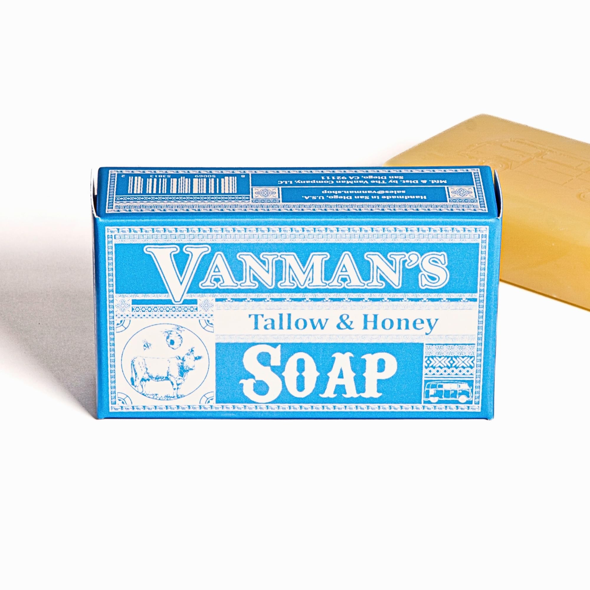 Closeup reveals creamy lather with raw honey within The VanMan bar.