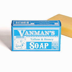 Closeup reveals creamy lather with raw honey within The VanMan bar.