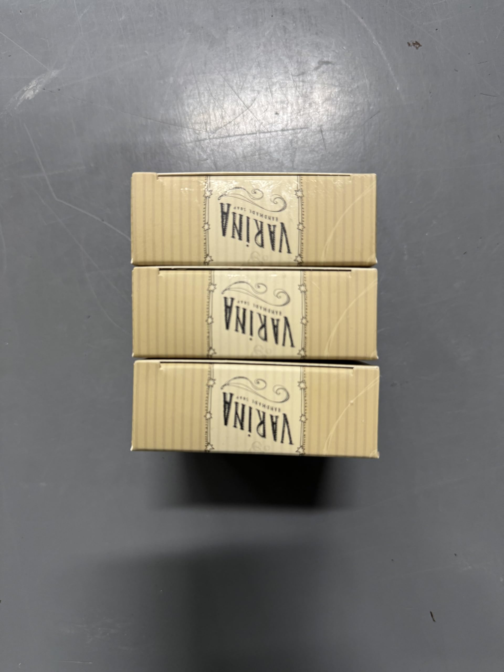 Varina tobacco flower soap lather on hand suggests gentle cleansing and soothing aroma.
