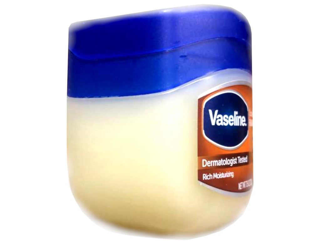Vaseline Rich Conditioning jelly applied to dry skin for gentle protection.