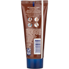 Vaseline Cocoa Glow jar being applied to hands for immediate moisturization.