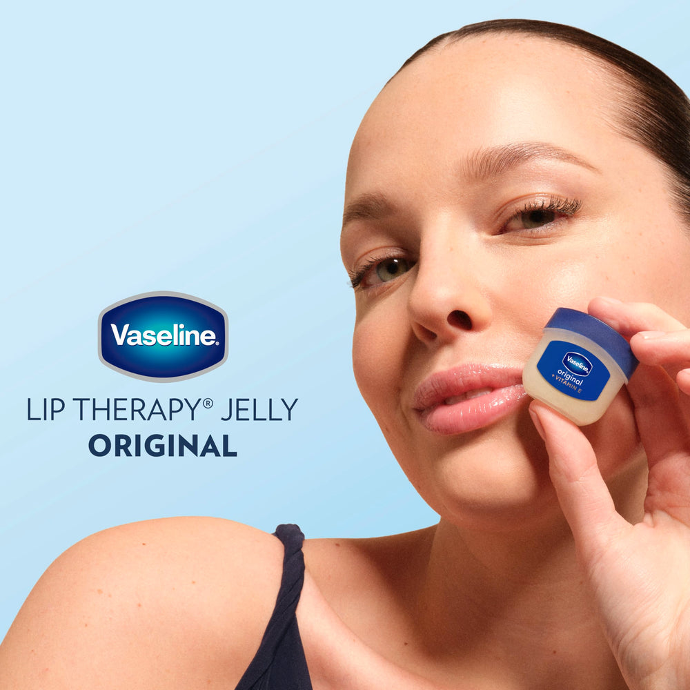 Vaseline Lip Therapy Original Mini protective barrier seals moisture on lips.