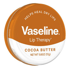 Vaseline Lip Therapy Cocoa Butter texture close-up conveys soothing, protective moisture.