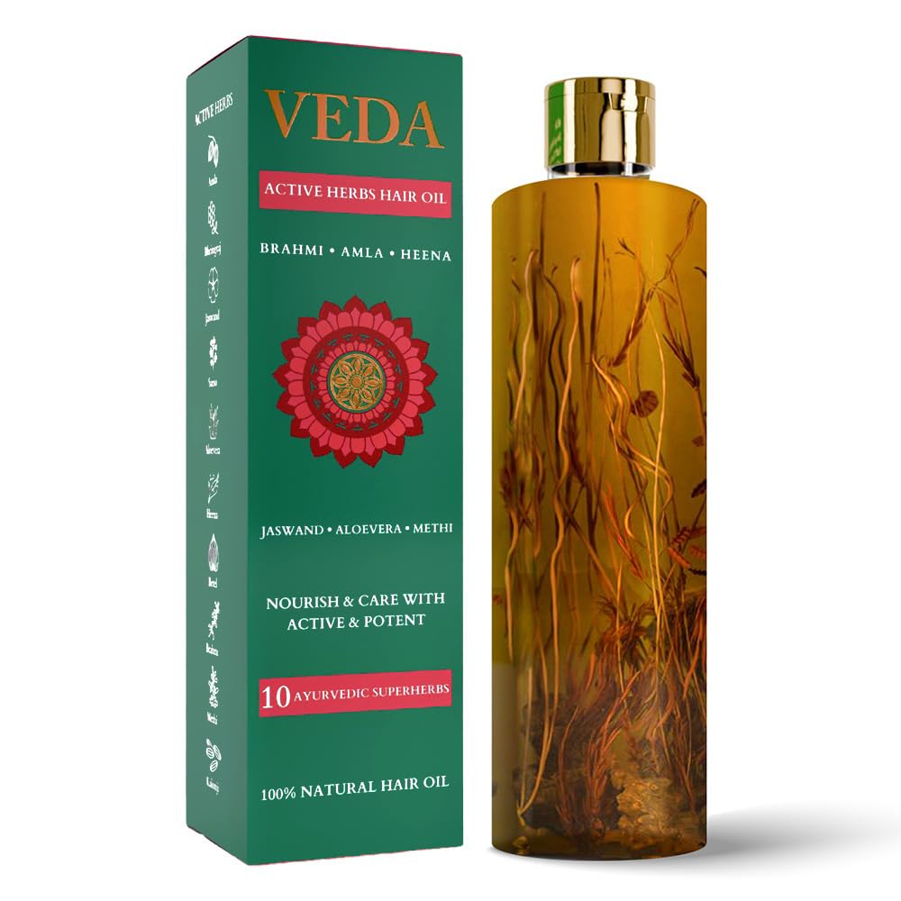 VEDA Active Herbs Hair Oil bottle close-up highlighting lightweight, fast absorption.
