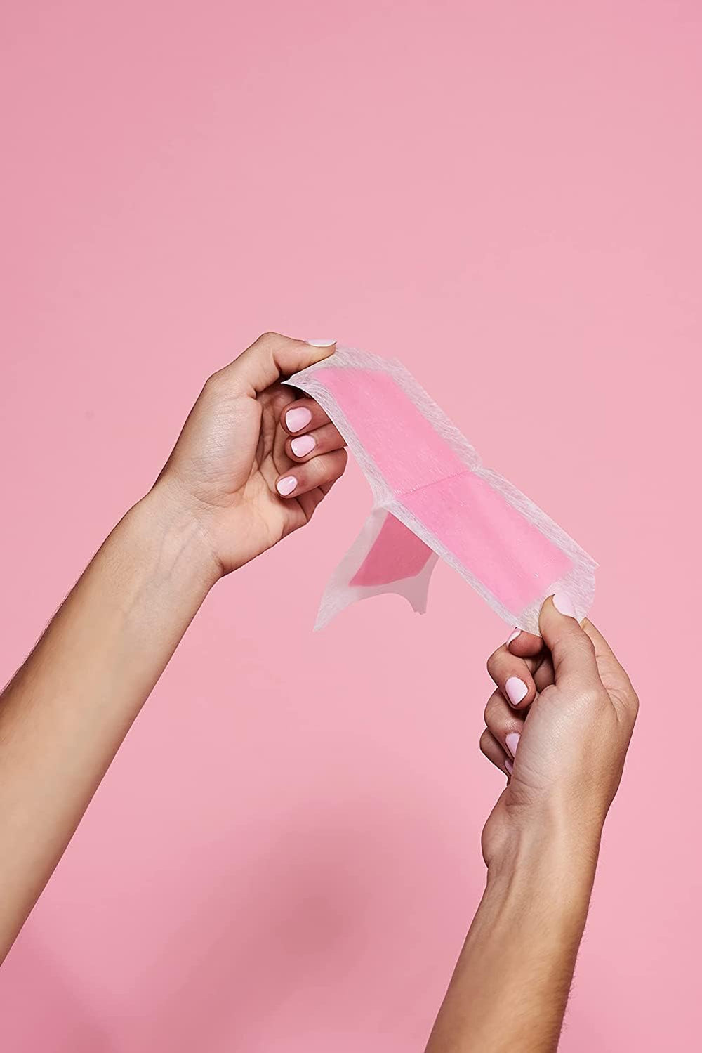 Veet warm strips by rubbing hands before removal.