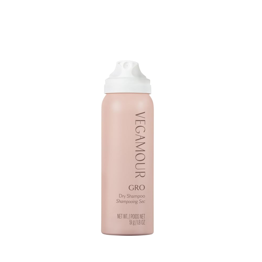 VEGAMOUR GRO Dry Shampoo travel-size bottle for on-the-go refresh and oil absorption.