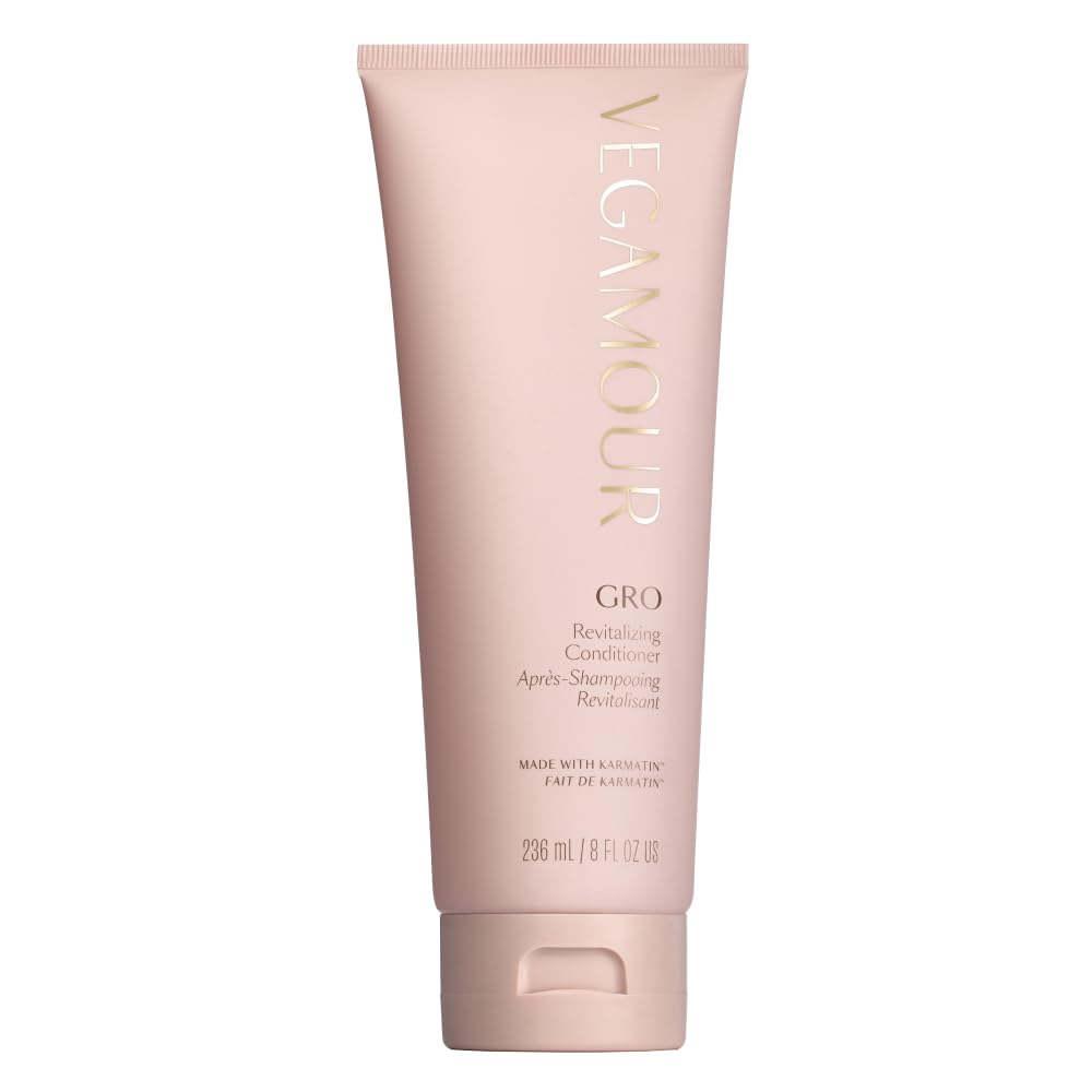 VEGAMOUR GRO Revitalizing Conditioner bottle shown with hints of hydration and breakage reduction potential