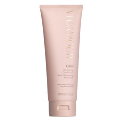 VEGAMOUR GRO Revitalizing Conditioner bottle shown with hints of hydration and breakage reduction potential