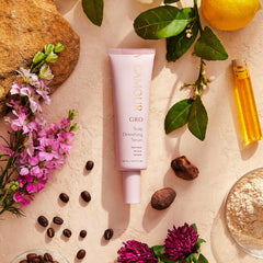 Hand applying GRO serum before washing with Revitalizing Shampoo
