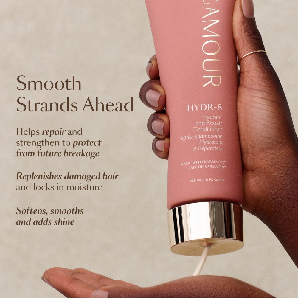Hands applying VEGAMOUR HYDR-8 to damp hair for nourishment