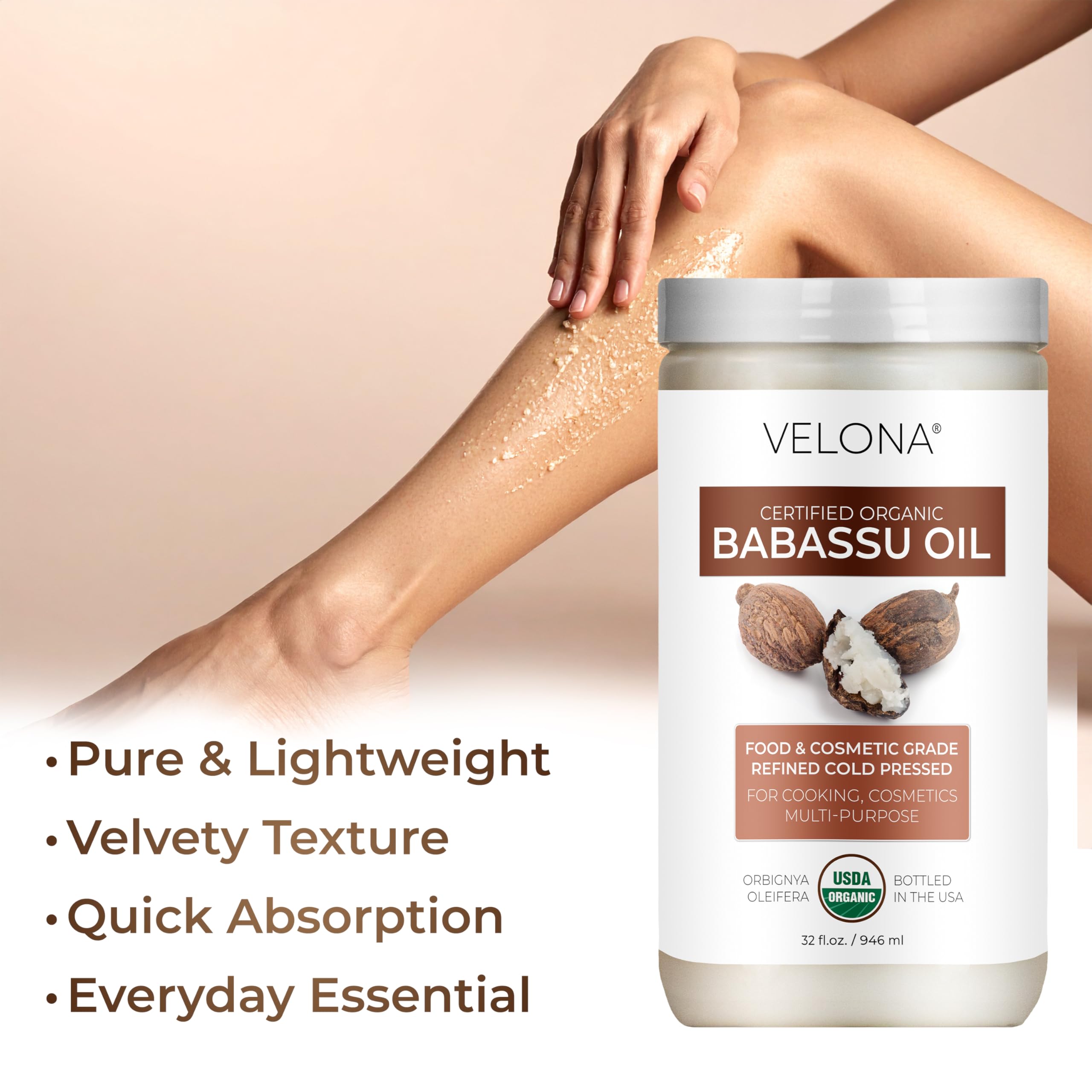 Velona Babassu Oil application hand—softens dry skin and hair.
