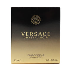 Versace Crystal Noir bottle close-up highlighting amber floral elegance for evening wear