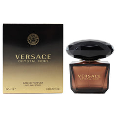 Versace Crystal Noir cap close-up showcasing luxe design and premium brand appeal
