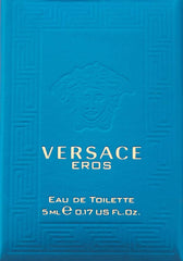Close-up of Versace Eros mini EDT bottle, premium glass and logo.