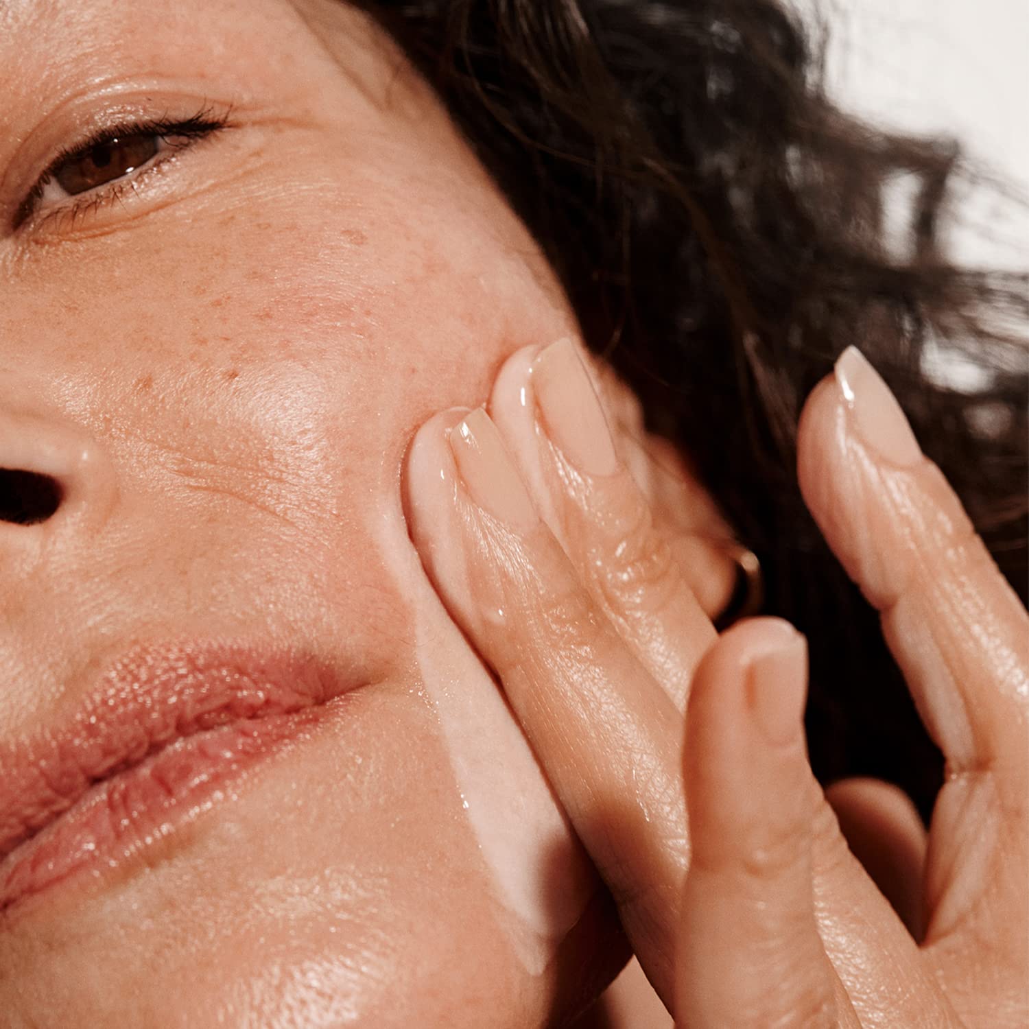 Versed Auto-Save swirling texture shows smooth, non-greasy skin finish