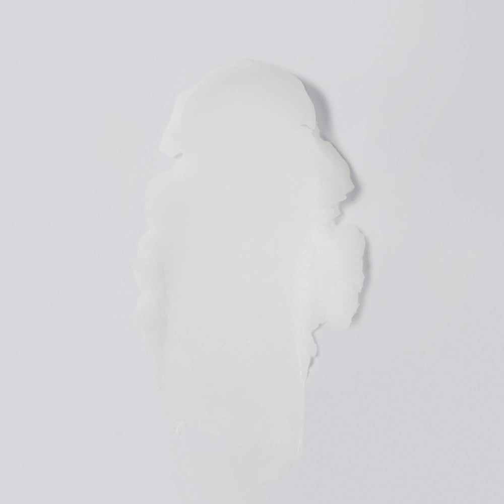Versed Day Dissolve jar closeup highlighting creamy texture that melts makeup.