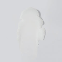 Versed Day Dissolve jar closeup highlighting creamy texture that melts makeup.
