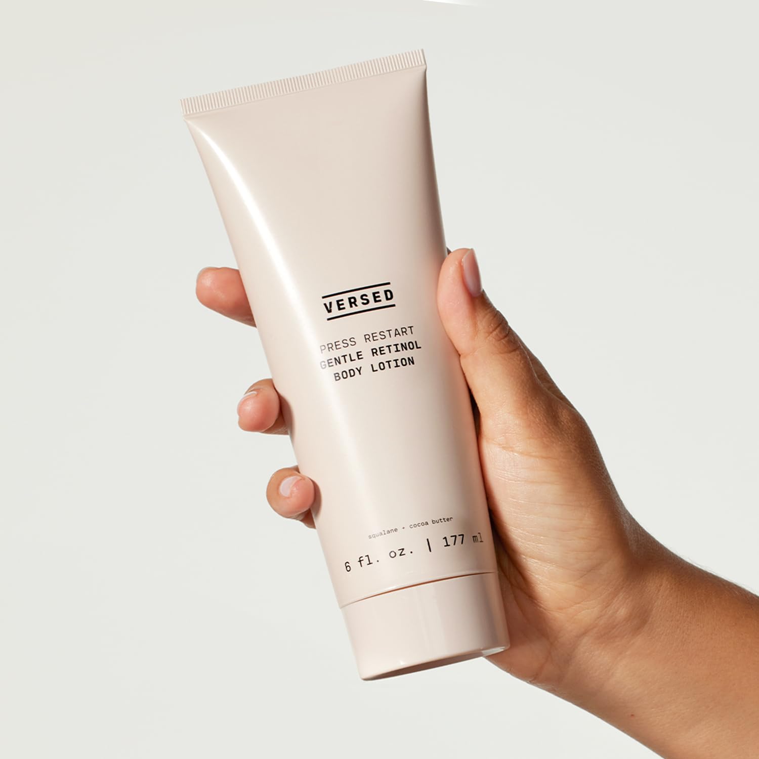 Versed Press Restart retinol body lotion packaging on display highlighting vegan formula
