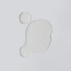 Versed Skin Soothe toner being swiped on the face for routine prep.