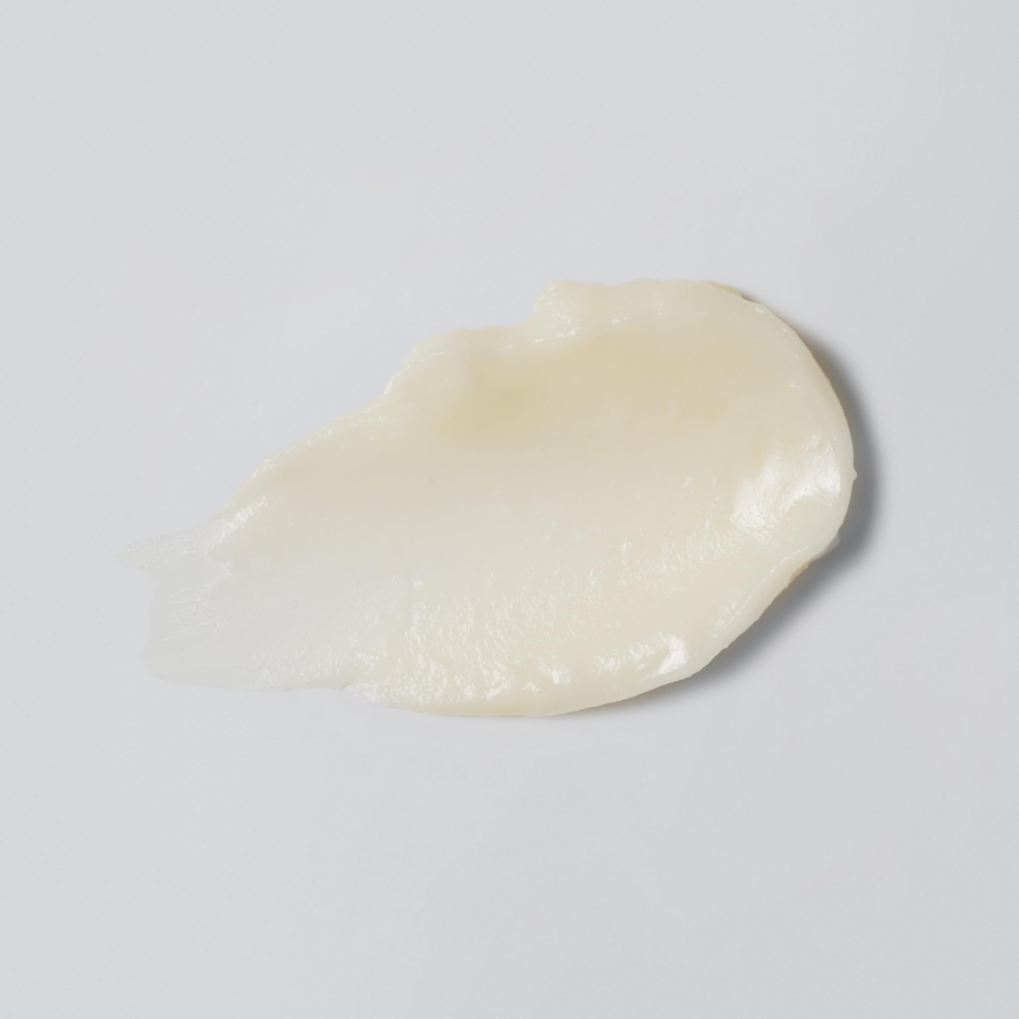 Texture closeup of Versed Smooth Landing eye balm smoothing fine lines